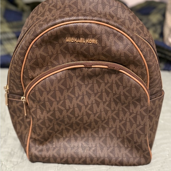 Michael Kors Handbags - Michael Kors Brown Monogram Backpack with Dome Shape